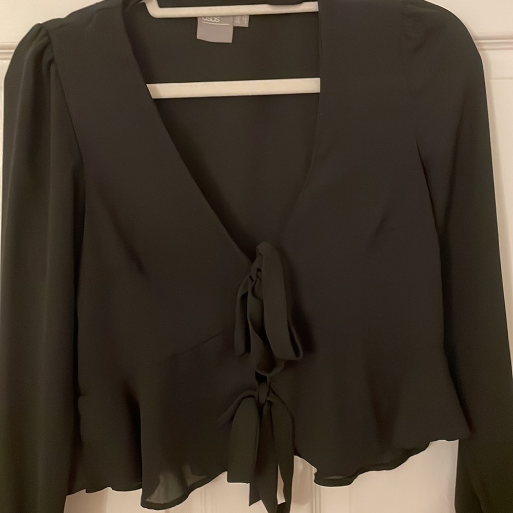 Black going out top